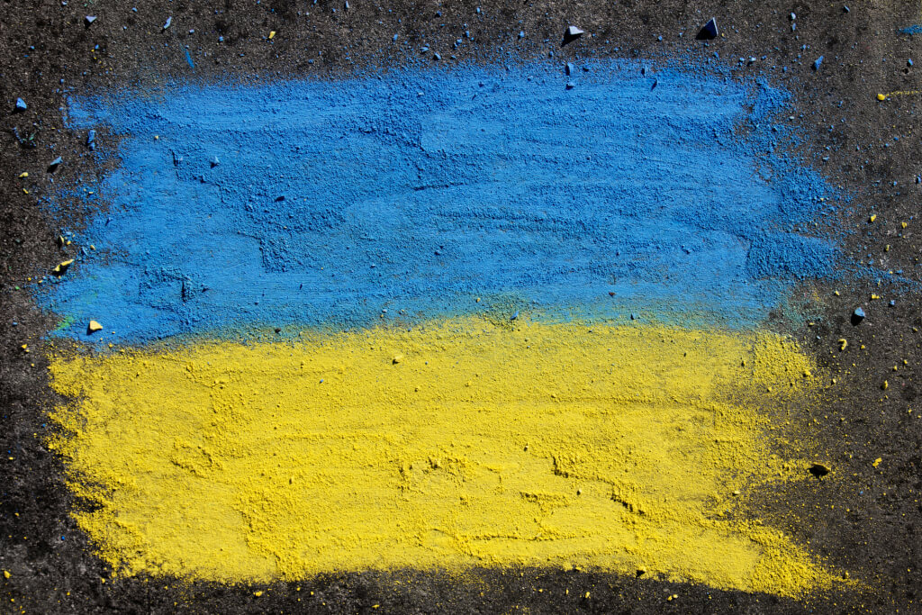 Flag of Ukraine. Chalk drawing on sidewalk