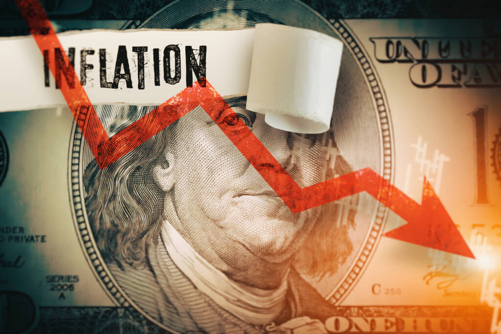 Inflation word under the torn dollar bill